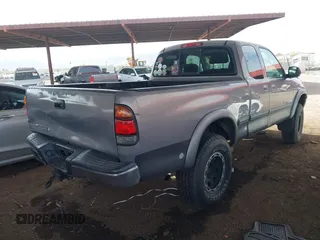 2000 Toyota Tundra SR5 with VIN 5TBRN3415YS049029, listed as a IAAI auction lot 41731441 with 202,100 mi miles and . Bid and sale history available at DreamBid. Image 4.