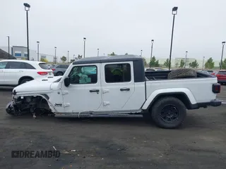 2020 Jeep Gladiator Sport S with VIN 1C6HJTAG9LL194454, listed as a IAAI auction lot 42430339 with 90,461 mi miles and . Bid and sale history available at DreamBid. Image 15.