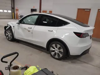 2022 Tesla Model Y Long Range z VIN 7SAYGDEE3NF358487, wystawiony jako IAAI lot #42036969 z przebiegiem 52 723 mil mil oraz . Historia ofert i sprzedaży dostępna na DreamBid. Obrazek 3.