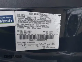 2008 Ford Focus SE with VIN 1FAHP35N08W105379, listed as a IAAI auction lot 41424575 with 210,985 mi miles. Bid and sale history available at carsss.com. Image 9.