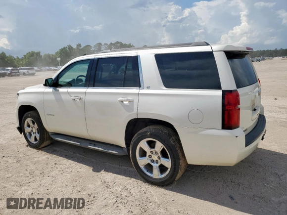 2015 Chevrolet Tahoe LT with VIN 1GNSCBKC5FR302611, listed as a Copart auction lot 62068165 with 184,136 mi miles and Salvage title. Bid and sale history available at DreamBid. Image 2.
