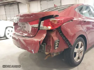 2012 Hyundai Elantra GLS with VIN KMHDH4AE2CU304144, listed as a IAAI auction lot 41215924 with 151,823 mi miles. Bid and sale history available at carsss.com. Image 6.