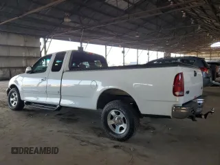 2003 Ford F-150 XL with VIN 1FTRX17L13NB49209, listed as a Copart auction lot 44453395 with 145,262 mi miles and Salvage Title. Bid and sale history available at carsss.com. Image 2.