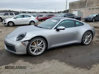 2022 Porsche 911 Carrera with VIN WP0AA2A98NS205474, listed as a Copart auction lot 40023494 with 9,889 mi miles. Bid and sale history available at carsss.com. Image 1.