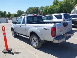 2001 Nissan Frontier SE Desert Runner z VIN 1N6ED26T51C362345, wystawiony jako IAAI lot #42324055 z przebiegiem 233 809 mil mil oraz . Historia ofert i sprzedaży dostępna na DreamBid. Obrazek 3.