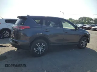 2018 Toyota RAV4 LE with VIN JTMBFREV5JJ736492, listed as a Copart auction lot 63794335 with 97,374 mi miles and Clean title. Bid and sale history available at DreamBid. Image 3.