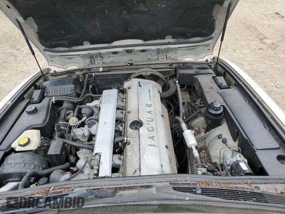 1997 Jaguar XJ Vanden Plas with VIN SAJKX6245VC800386, listed as a Copart auction lot 53651675 with 158,185 mi miles and Salvage Title. Bid and sale history available at DreamBid. Image 11.