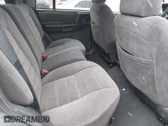 1997 Jeep Grand Cherokee Laredo with VIN 1J4GZ58Y8VC624804, listed as a IAAI auction lot 41736324 with 165,851 mi miles. Bid and sale history available at carsss.com. Image 8.