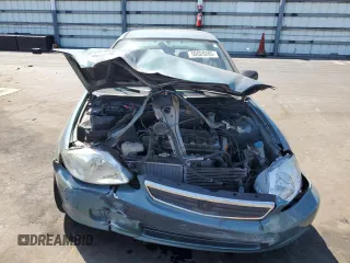 2000 Honda Civic VP z VIN 2HGEJ6613YH558116, wystawiony jako Copart lot #50028285 z przebiegiem 138 436 mil mil oraz Szkoda całkowita • Salvage title. Historia ofert i sprzedaży dostępna na DreamBid. Obrazek 5.