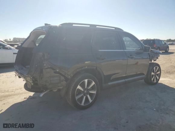 2023 Honda Pilot Touring with VIN 5FNYG2H7XPB013667, listed as a Copart auction lot 73353154 with 10,994 mi miles and Salvage Title. Bid and sale history available at carsss.com. Image 3.