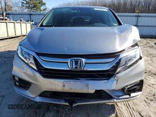 2020 Honda Odyssey EX-L with VIN 5FNRL6H73LB056720, listed as a Copart auction lot 87205024 with 60,219 mi miles and Salvage Title. Bid and sale history available at carsss.com. Image 5.