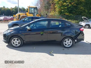 2015 Ford Fiesta SE with VIN 3FADP4BJXFM189438, listed as a IAAI auction lot 40535245 with 102,013 mi miles. Bid and sale history available at carsss.com. Image 14.