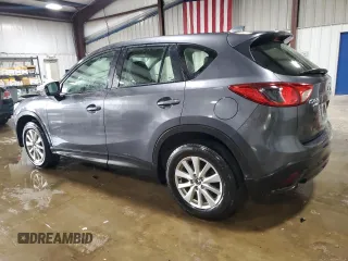 2014 Mazda CX-5 Sport with VIN JM3KE4BEXE0430076, listed as a Copart auction lot 58164695 with 183,130 mi miles and Salvage title. Bid and sale history available at DreamBid. Image 2.
