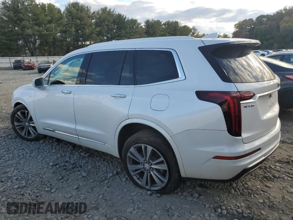 2020 Cadillac XT6 FWD Premium Luxury with VIN 1GYKPCRS2LZ138465, listed as a Copart auction lot 76114034 with 57,353 mi miles and Salvage Title. Bid and sale history available at carsss.com. Image 2.