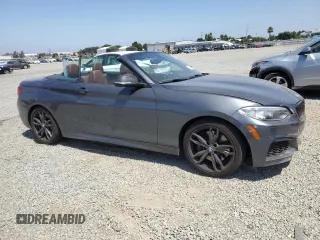 2017 BMW 2 Series with VIN WBA2L1C34HV666785, listed as a Copart auction lot 61775835 with 57,386 mi miles and Salvage title. Bid and sale history available at DreamBid. Image 4.