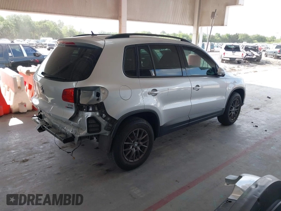 2016 Volkswagen Tiguan S with VIN WVGBV7AX2GW535784, listed as a IAAI auction lot 42130041 with 35,718 mi miles and . Bid and sale history available at DreamBid. Image 4.