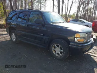 2002 GMC Yukon Denali z VIN 1GKEK63U62J327456, wystawiony jako IAAI lot #41663903 z przebiegiem 240 544 mil mil oraz . Historia ofert i sprzedaży dostępna na DreamBid. Obrazek 1.