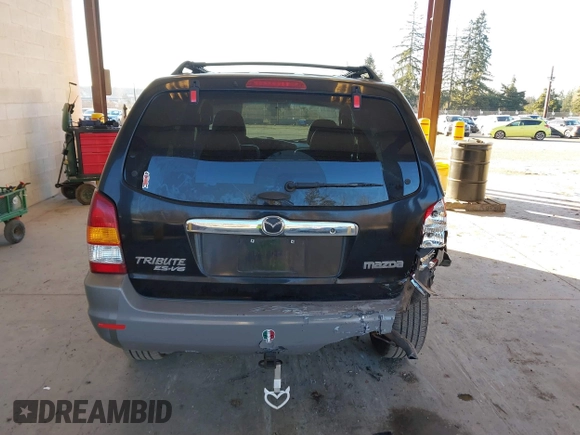 2002 Mazda Tribute LX with VIN 4F2CU08172KM58561, listed as a IAAI auction lot 41435407 with 141,908 mi miles and . Bid and sale history available at carsss.com. Image 16.