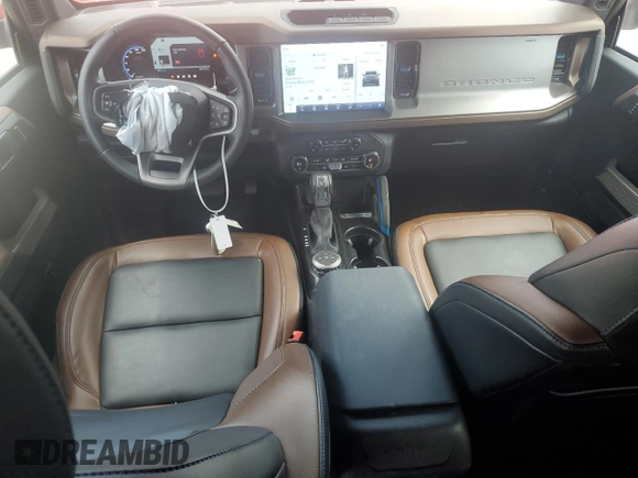 2023 Ford Bronco with VIN 1FMDE5BHXPLB99680, listed as a Copart auction lot 54232455 with 16,579 mi miles and Salvage Title. Bid and sale history available at DreamBid. Image 8.