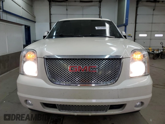 2014 GMC Yukon Denali with VIN 1GKS2EEF6ER141112, listed as a Copart auction lot 88526685 with 142,248 mi miles and Salvage Title. Bid and sale history available at carsss.com. Image 5.