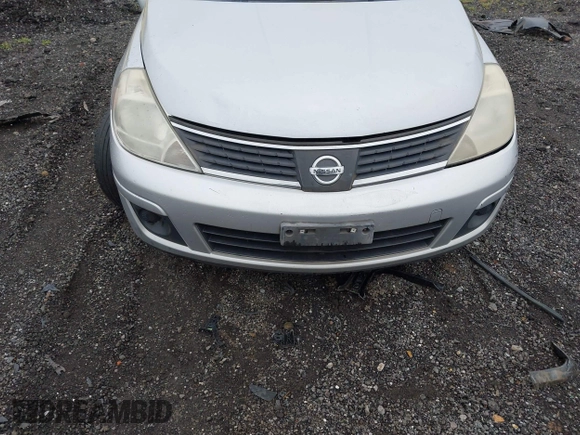 2008 Nissan Versa 1.8 S with VIN 3N1BC13EX8L369608, listed as a IAAI auction lot 42046943 with 133,826 mi miles. Bid and sale history available at carsss.com. Image 6.