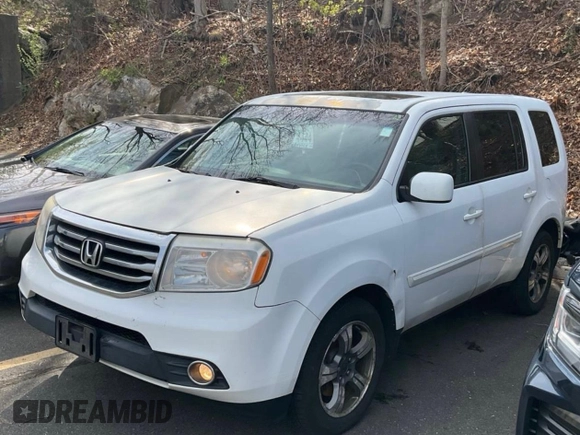 2015 Honda Pilot SE with VIN 5FNYF4H39FB028011, listed as a IAAI auction lot 42160830 with 202,846 mi miles and . Bid and sale history available at DreamBid. Image 2.