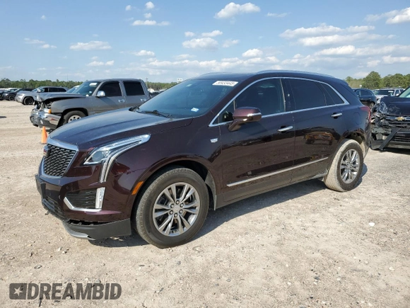 2021 Cadillac XT5 FWD Premium Luxury with VIN 1GYKNCRS2MZ180884, listed as a Copart auction lot 50433445 with 27,246 mi miles and Salvage Title. Bid and sale history available at carsss.com. Image 1.