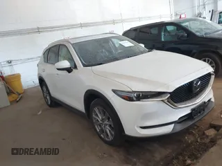 2019 Mazda CX-5 Grand Touring with VIN JM3KFBDM5K0520852, listed as a IAAI auction lot 42686818 with 36,800 mi miles and . Bid and sale history available at DreamBid. Image 1.
