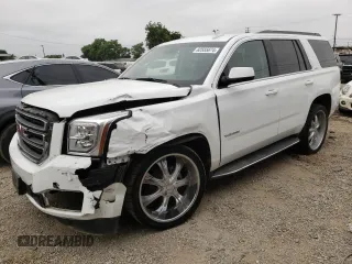 2017 GMC Yukon SLT with VIN 1GKS2BKC9HR125757, listed as a Copart auction lot 73427934 with 72,333 mi miles and Salvage Title. Bid and sale history available at carsss.com. Image 1.