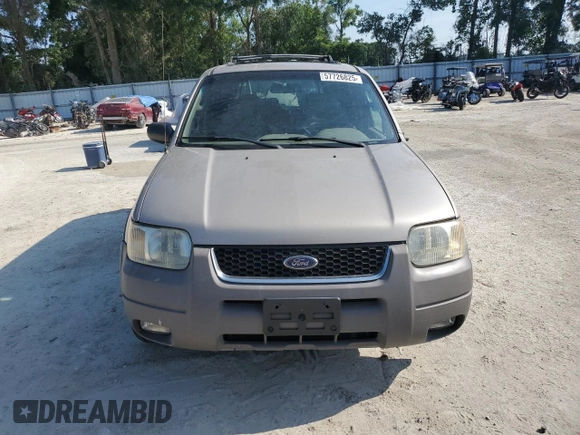 2001 Ford Escape XLT с VIN 1FMCU04131KC39323, выставлен на аукционе Copart как лот 57726825 с пробегом 170 104 миль миль и Списание • Salvage title. История ставок и продаж доступна на DreamBid. Изображение 5.