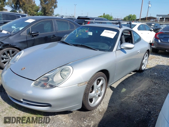 1999 Porsche 911 with VIN WP0AA2991XS623852, listed as a IAAI auction lot 42207441 with 100,548 mi miles and . Bid and sale history available at DreamBid. Image 2.