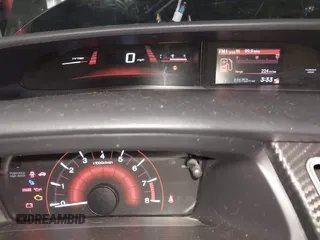 2013 Honda Civic Si with VIN 2HGFG4A52DH702024, listed as a IAAI auction lot 42527107 with 76,752 mi miles and . Bid and sale history available at DreamBid. Image 7.