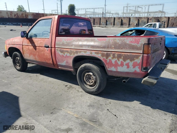 1987 Nissan Regular Bed 2WD E with VIN JN6ND11S3HW006235, listed as a Copart auction lot 78528914 with NaN miles and Salvage Title. Bid and sale history available at carsss.com. Image 2.