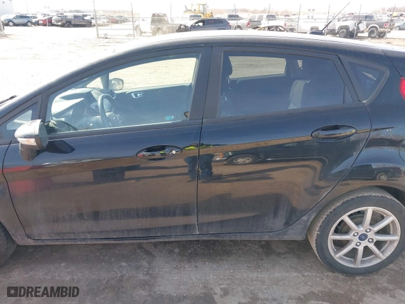 2016 Ford Fiesta SE with VIN 3FADP4EJ3GM170260, listed as a IAAI auction lot 41769063 with 137,970 mi miles. Bid and sale history available at carsss.com. Image 14.