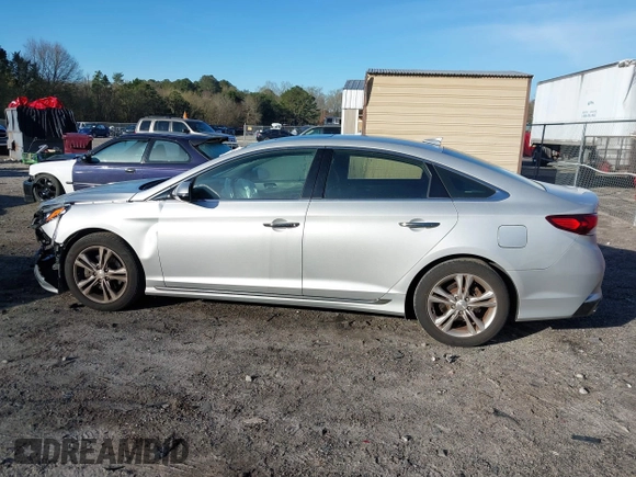 2018 Hyundai Sonata SEL z VIN 5NPE34AF0JH599137, wystawiony jako IAAI lot #41865261 z przebiegiem 63 719 mil mil oraz . Historia ofert i sprzedaży dostępna na DreamBid. Obrazek 14.