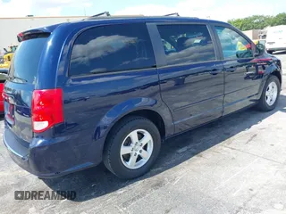 2013 Dodge Grand Caravan SXT with VIN 2C4RDGCG3DR611519, listed as a IAAI auction lot 42237571 with 156,858 mi miles and . Bid and sale history available at DreamBid. Image 4.