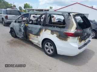 2015 Toyota Sienna L with VIN 5TDZK3DC2FS538700, listed as a IAAI auction lot 42180289 with Not provided miles and . Bid and sale history available at DreamBid. Image 3.