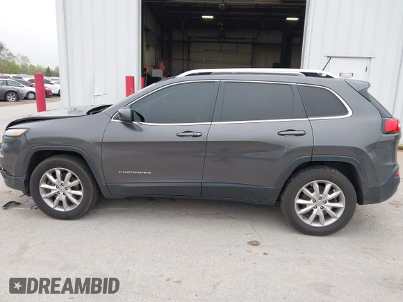 2014 Jeep Cherokee Limited z VIN 1C4PJMDB2EW182111, wystawiony jako IAAI lot #42179182 z przebiegiem 156 257 mil mil oraz . Historia ofert i sprzedaży dostępna na DreamBid. Obrazek 14.