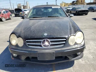 2006 Mercedes-Benz CLK-Class 5.0L with VIN WDBTK75G96T063299, listed as a Copart auction lot 69882884 with 148,934 mi miles and Salvage Title. Bid and sale history available at carsss.com. Image 5.