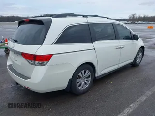 2016 Honda Odyssey EX-L with VIN 5FNRL5H64GB012832, listed as a IAAI auction lot 41881915 with 127,067 mi miles. Bid and sale history available at carsss.com. Image 4.