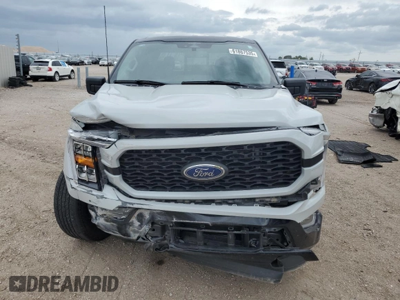 2023 Ford F-150 XL with VIN 1FTFW1E84PKE35275, listed as a Copart auction lot 61867535 with 22,142 mi miles and Salvage title. Bid and sale history available at DreamBid. Image 5.