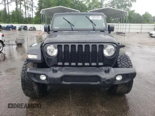 2021 Jeep Wrangler Unlimited Sport Altitude with VIN 1C4HJXDN5MW525525, listed as a Copart auction lot 55897605 with 54,554 mi miles and Salvage title. Bid and sale history available at DreamBid. Image 5.