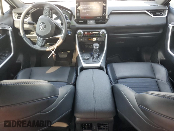 2022 Toyota RAV4 Hybrid XSE с VIN 2T3E6RFVXNW030847, выставлен на аукционе Copart как лот 57119115 с пробегом 64 757 миль миль и Списание • Salvage title. История ставок и продаж доступна на DreamBid. Изображение 8.