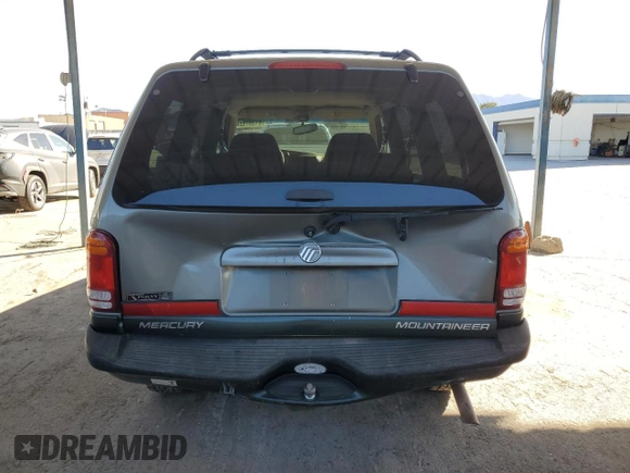 1999 Mercury Mountaineer z VIN 4M2ZU55P0XUJ06301, wystawiony jako Copart lot #81357924 z przebiegiem 181 750 mil mil oraz Szkody całkowita. Historia ofert i sprzedaży dostępna na DreamBid. Obrazek 6.