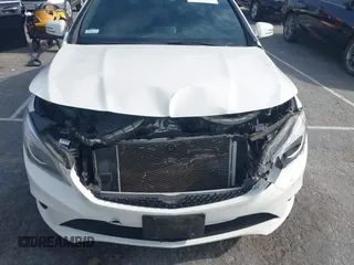 2014 Mercedes-Benz CLA 250 z VIN WDDSJ4EB0EN044118, wystawiony jako IAAI lot #42141130 z przebiegiem 76 122 mil mil oraz . Historia ofert i sprzedaży dostępna na DreamBid. Obrazek 6.