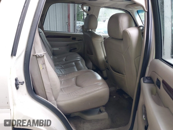 2003 Cadillac Escalade z VIN 1GYEK63NX3R241388, wystawiony jako IAAI lot #42227896 z przebiegiem 154 415 mil mil oraz . Historia ofert i sprzedaży dostępna na DreamBid. Obrazek 8.