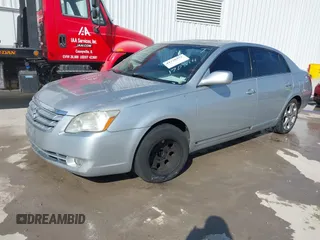 2007 Toyota Avalon XL with VIN 4T1BK36BX7U170894, listed as a IAAI auction lot 41778952 with 161,117 mi miles. Bid and sale history available at carsss.com. Image 2.