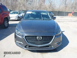 2017 Mazda 3 Grand Touring z VIN 3MZBN1W39HM137879, wystawiony jako IAAI lot #41857308 z przebiegiem 73 569 mil mil oraz . Historia ofert i sprzedaży dostępna na DreamBid. Obrazek 12.