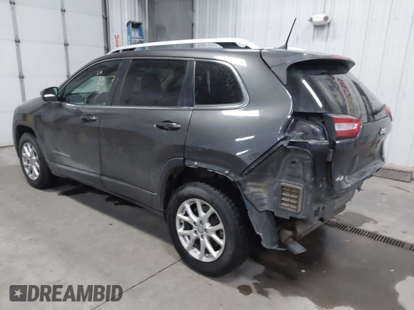 2016 Jeep Cherokee Latitude z VIN 1C4PJMCB1GW367092, wystawiony jako IAAI lot #41101266 z przebiegiem 96 500 mil mil oraz . Historia ofert i sprzedaży dostępna na DreamBid. Obrazek 3.