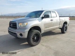 2010 Toyota Tundra 2WD Truck with VIN 5TFRM5F17AX014706, listed as a IAAI auction lot 41580313 with 209,482 mi miles. Bid and sale history available at carsss.com. Image 2.